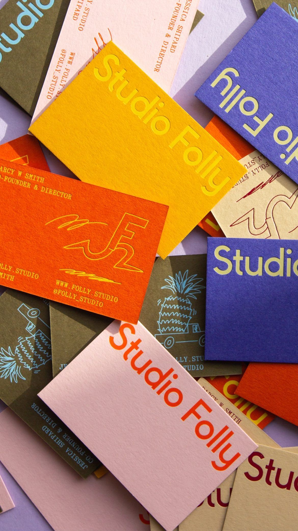 Multi-colour foiled letterpress business cards with illustrations for Studio Folly